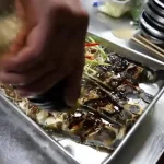 ببینید؛ غذای خیابانی در چین؛ پخت انواع غذا با یک ماهی کمیاب در چینگ دائو